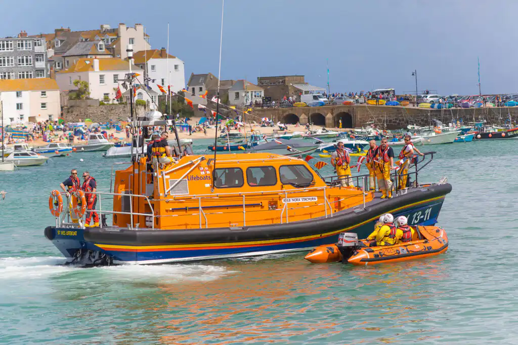 The St Ives branch of the RNLI departing St Ives Harbour, one of the most famous harbours in Cornwall, the RNLI one of many great Cornish charities.