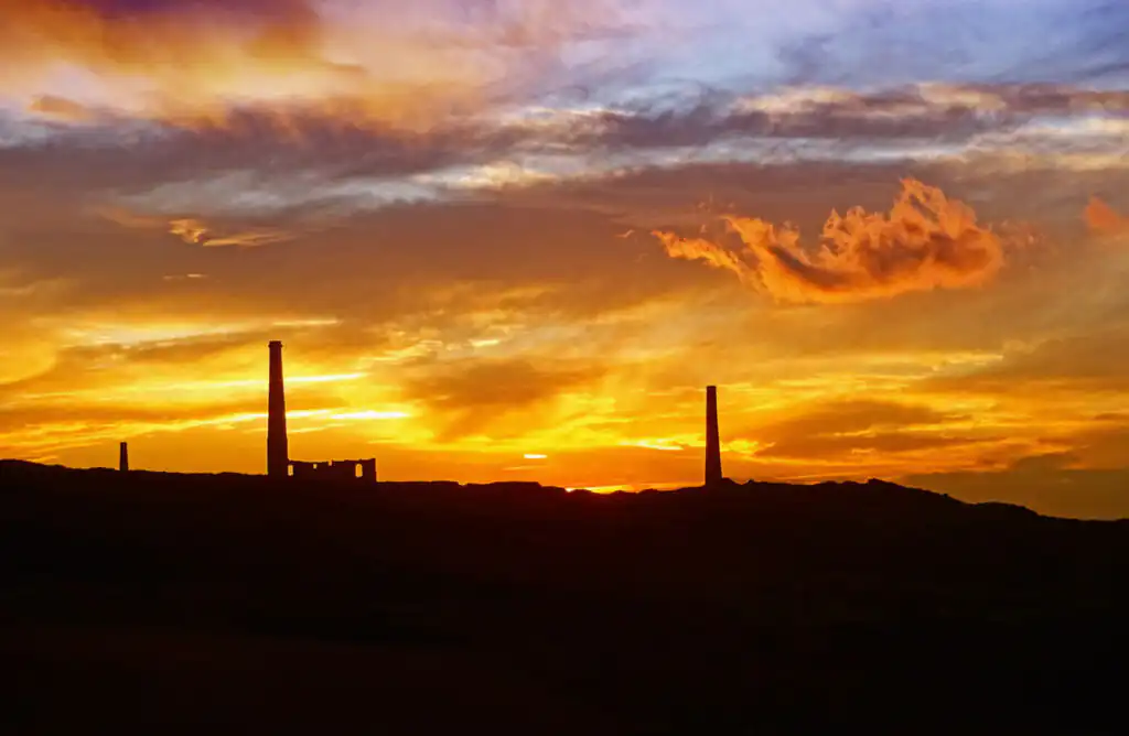 Geevor Tin mine, located in West Cornwall, at sunset, home to Cornish myths and legends.
