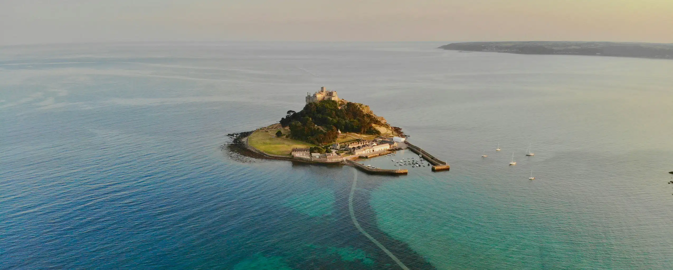 An aerial of St Michael's Mount, a top tourist destination to visit from a Mounts Bay Holiday Cottage.