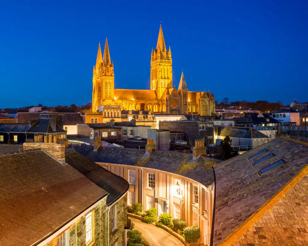 Truro Cathedral, a well-known tourist attraction, illuminated at night.