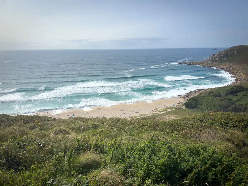 People relax at Gwenver Beach in Cornwall, a popular spot near Sennen.
