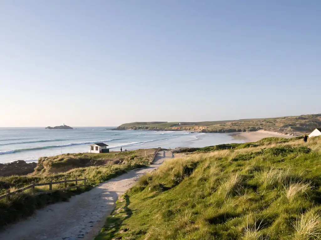 Godrevy Lighthouse past Gwithian, visible from a Hayle cottage with sea views.