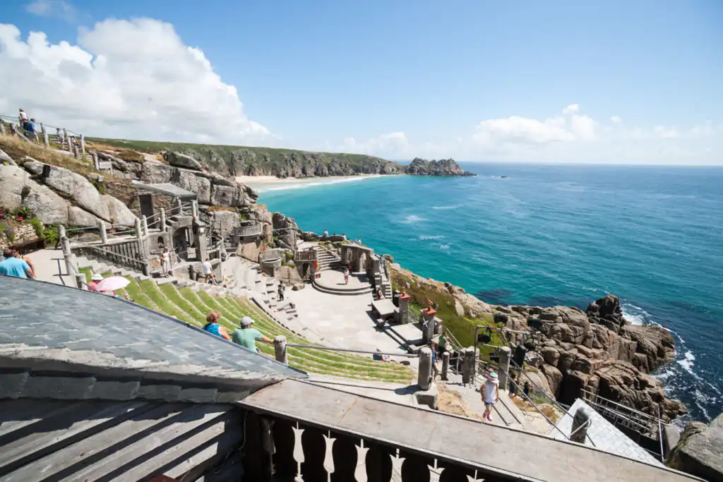 Ocean view from a balcony at the Minack Theatre in Cornwall, showcasing the stunning coastline, an ideal October Half Term activity.