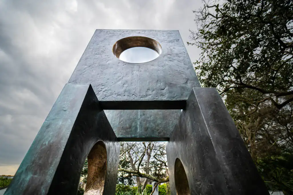A large metal sculpture featuring a circular opening, displayed at the Barbara Hepworth Museum in St Ives, a great part of a day in St Ives.