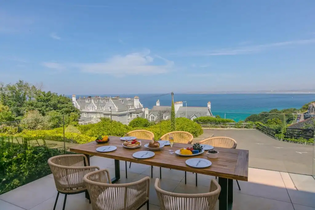 The living area at Blue Albany, a dog friendly holiday cottage by the sea in Cornwall.