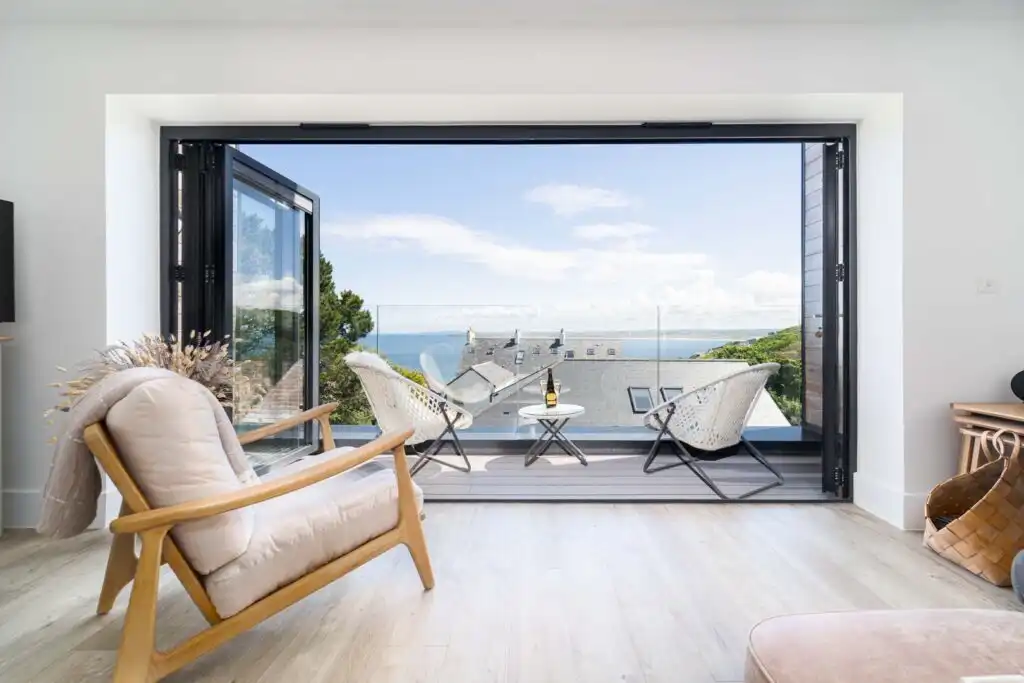 The living area at Del Mar, a dog friendly holiday cottage by the sea in Cornwall.