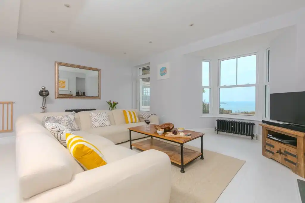 The living area at Heatherleigh, a dog friendly holiday cottage by the sea in Cornwall.