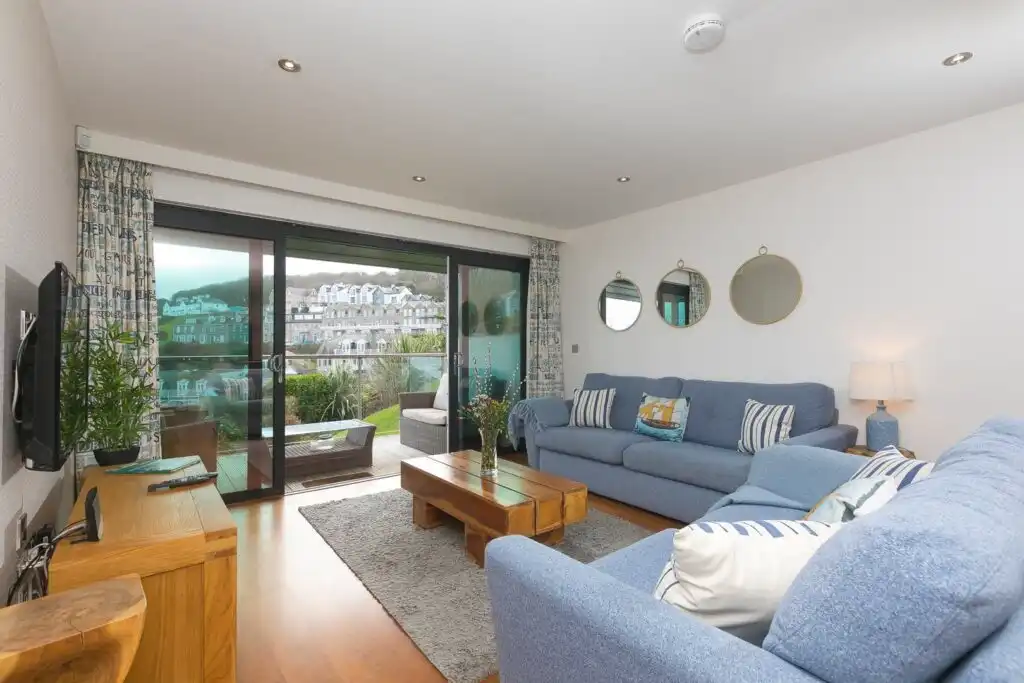 The living area at Number One Peninsula, a dog friendly holiday cottage by the sea in Cornwall.