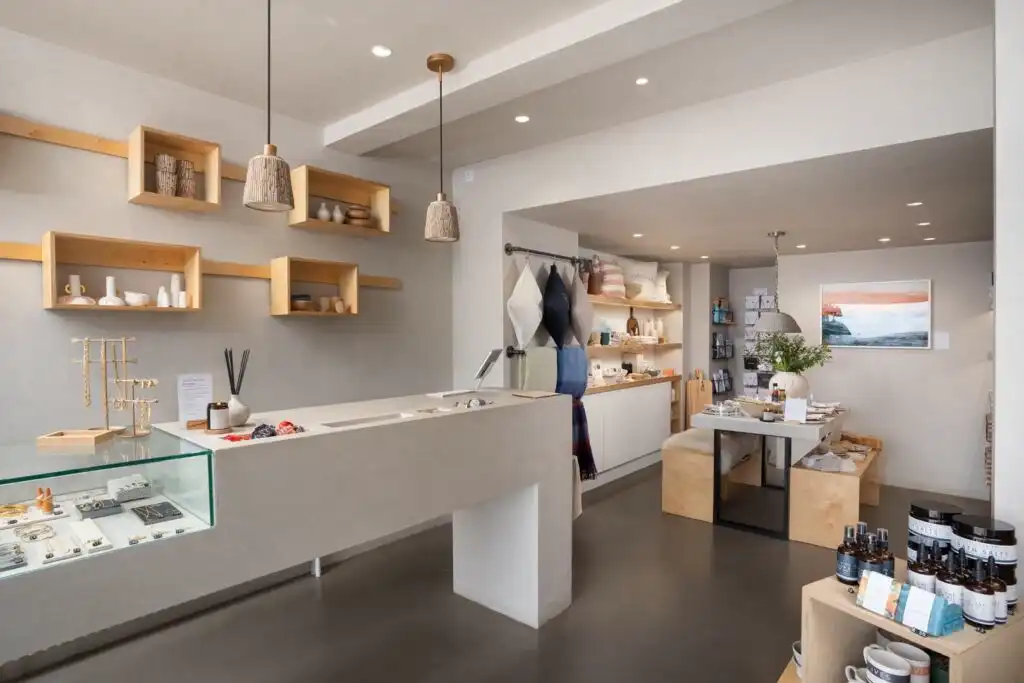 Interior of The St. Ives Co. shop, showcasing shelves filled with a variety of unique products and local goods, an independent shop in St Ives.